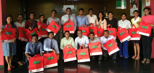 DFCC Reusable Bag being presented to CEO, Deputy CEO and staff