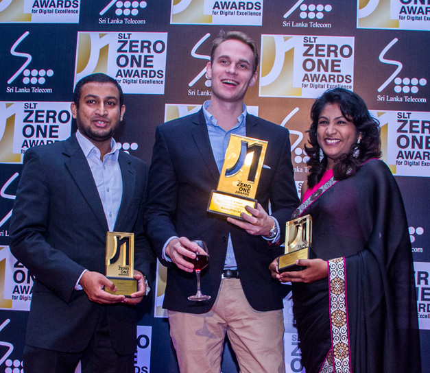 L-R: Mohamed Shaif, Director – Operations, Alexander Lowback, Managing Director and Shiwanthie Wijesuriya, Human Resources Manager of ikman.lk at the award ceremony