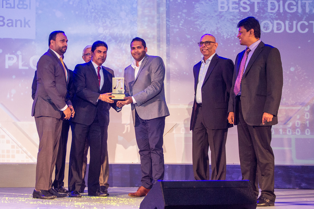 From left – Lasitha Suraweera, Assistant Brand Manager, Sampath Bank and Tharaka Ranwala, Senior Deputy General Manager - Consumer Banking, Sampath Bank accepting the award from Hon. Minister of Telecommunication and Digital Infrastructure, Harin Fernando in the presence of Dileepa Wijesundara, Group Chief Executive Officer (CEO), Sri Lanka Telecom and Ajantha Seneviratne, Group Chief Marketing Officer (CMO), Sri Lanka Telecom