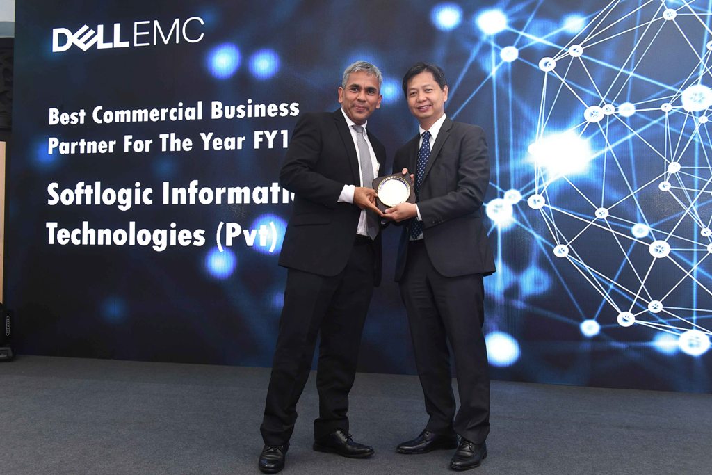 1. Softlogic Information Technologies (Pvt) Ltd DirectorCEO Roshan Rassool receiving the Best Commercial Business Partner award for FY18 from Dell EMC Vice President Asia Emerging Markets