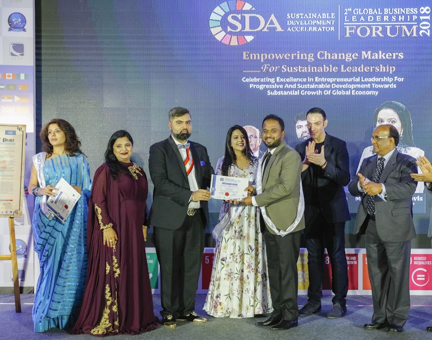 1. Prassanna receiving his Global Peace Ambassodor Award from the First Lady of Maharashtra, Mrs. Amruta Fadnavis and Founder & President of WPDO Prof. Dr. GD Singh