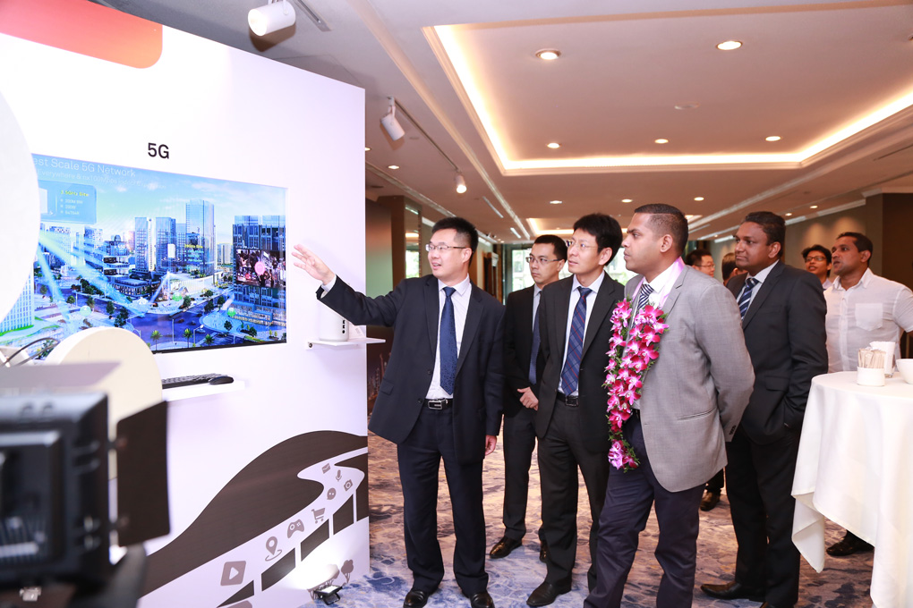 Minister of Telecommunication, Digital Infrastructure and Foreign Employment Hon. Harin Fernando visiting the Carrier Congress Exhibition Stalls during his visit to the event, accompanied by