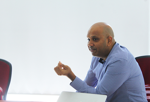 Prajeeth Balasubramaniam speaking at a recent LAN event