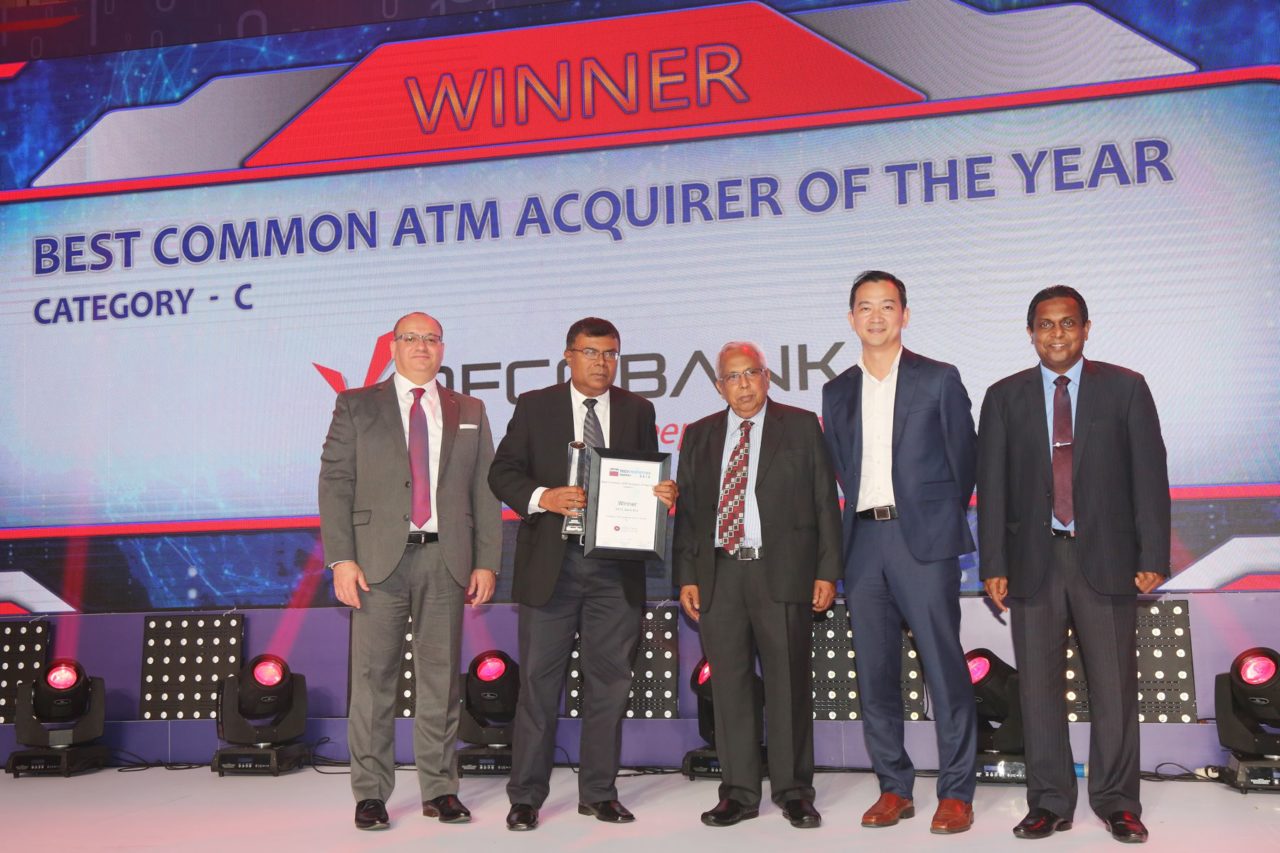 Gemunu Gunasumana - AVP Card Operations DFCC Bank receiving the award for Best Common ATM Acquirer of the Year