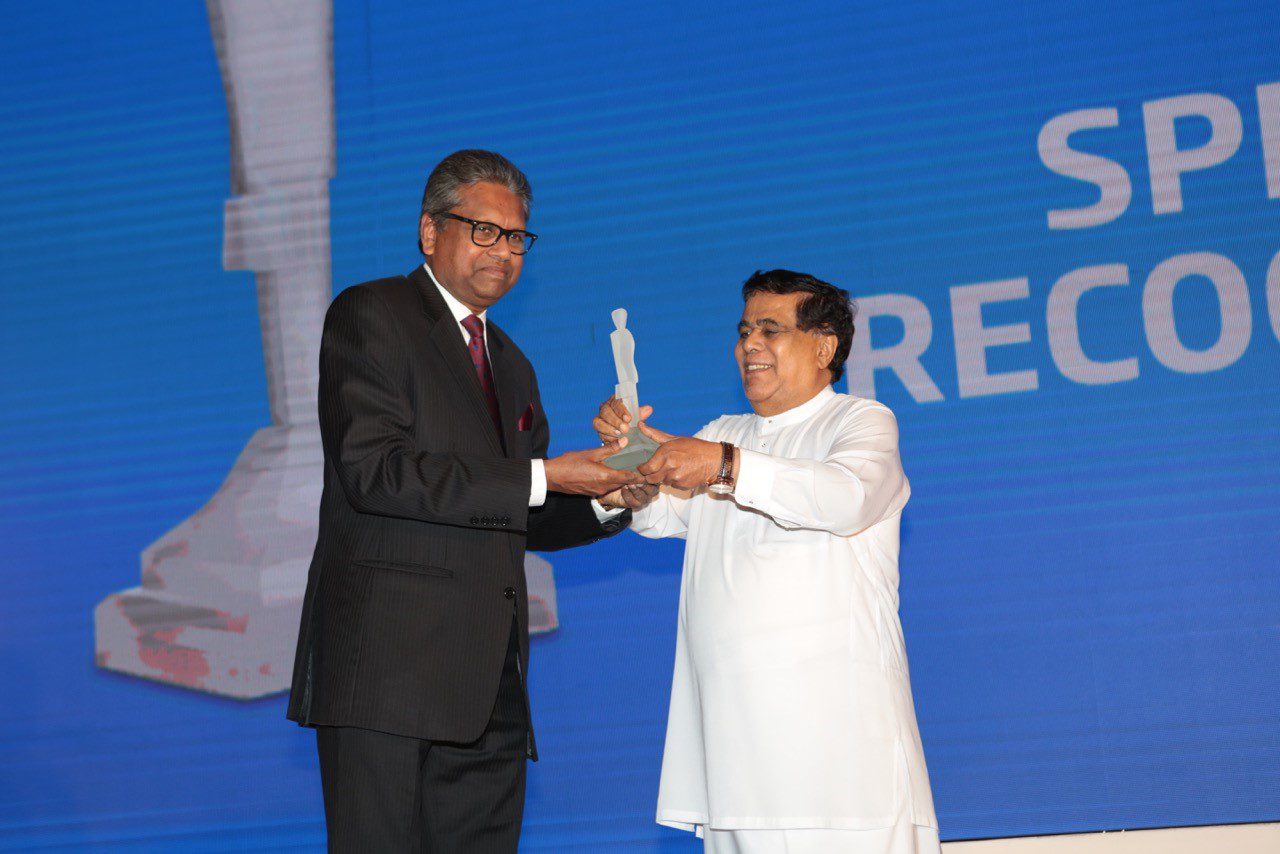 BT TOP 30 Award presented to Dr. Harsha Cabral PC, Chairman TOKYO CEMENT GROUP by Hon Nimal Siripala de Silva, Minister of Transport & Civil Aviation