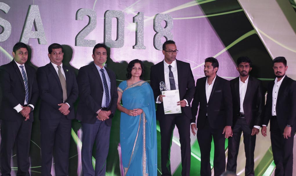 The eMarketingEye team receiving the award at NBQSA 2018