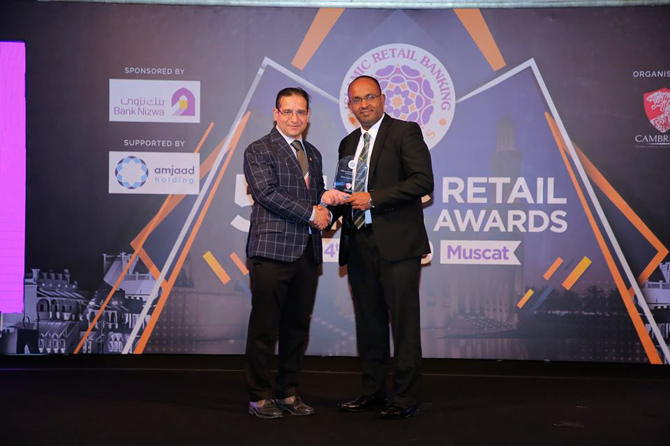 AmÃ£na-Bank-Vice-President-Retail-Banking-&-Marketing-Siddeeque-Akbar-receiving-the-award-from-Professor-Humayon-Dar-of-Cambridge-International-Financial-Advisory