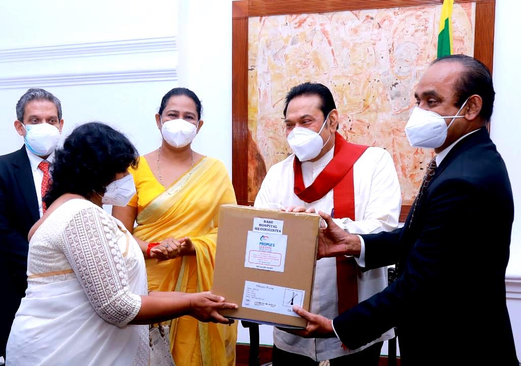 PLC - 25 M Donation -Dr. Mrs. E. Rajapakshe, the Medical Superintendent of the Base Hospital Marawila,