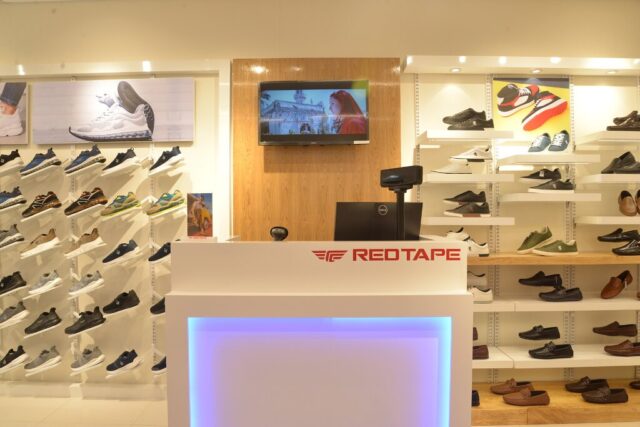 Red tape sale shoes showroom