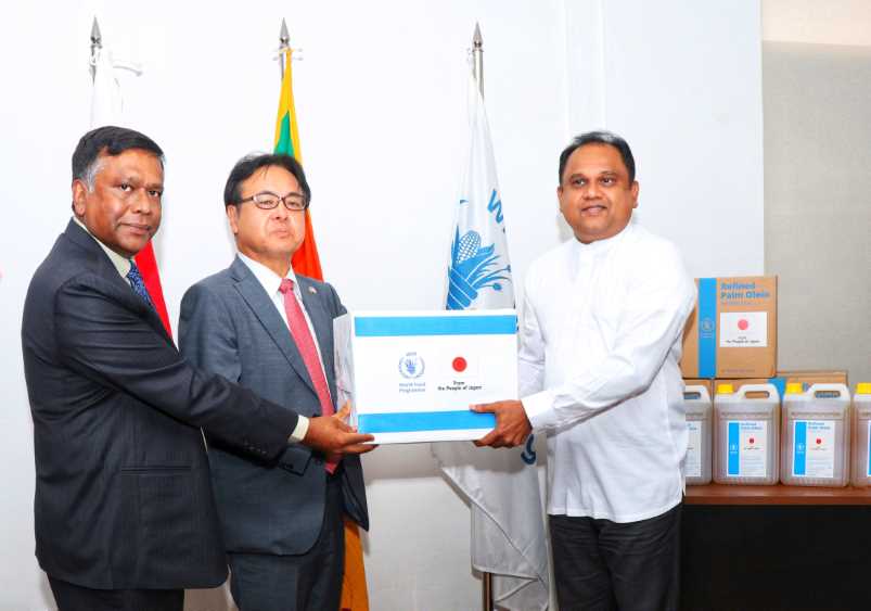 The first tranche of food assistance pledged by the Government of Japan was handed over the Minister of Trade. (LBN Fill)